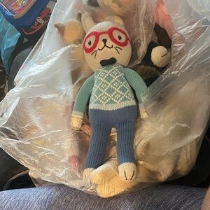 Cozy Knit Bunny with Red Glasses